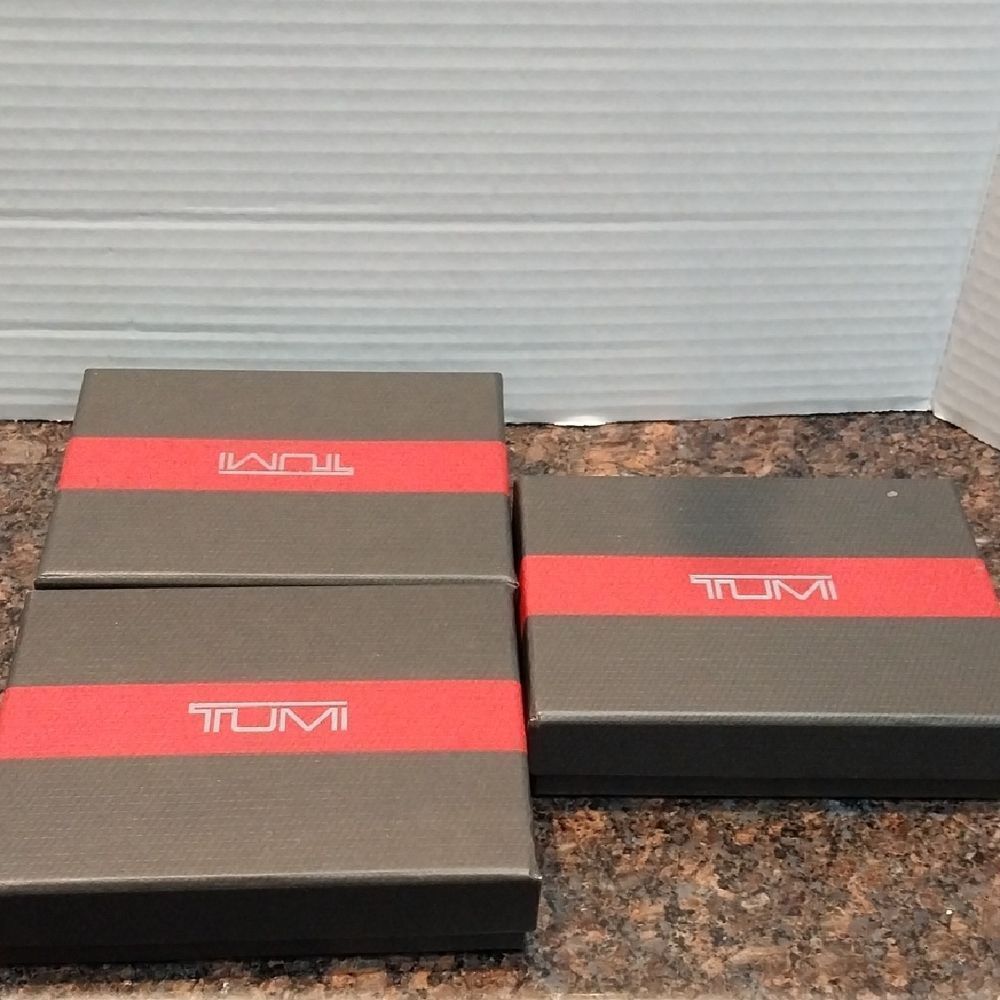 Three TumiโBlack and Red Key & Card Holder Boxes...EUC